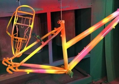 Multicolored bicycle chassis done by Tallaght Powder Coating Ltd.