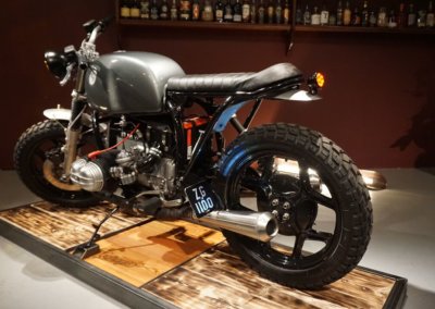 A gray BMW big bike in a showroom event for Tallaght Powder Coating