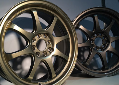 A pair of alloy mag wheels powder coated at TPC