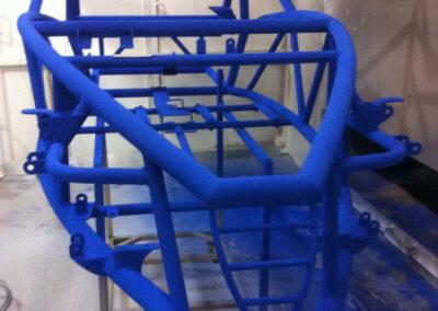 A motorcycle chassis first coating session at Tallaght Powder Coating