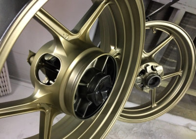 Alloy wheels in gold paint by Tallaght Powder Coating