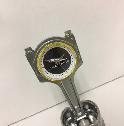 desk clock made from a repurposed Jaguar engine piston.
